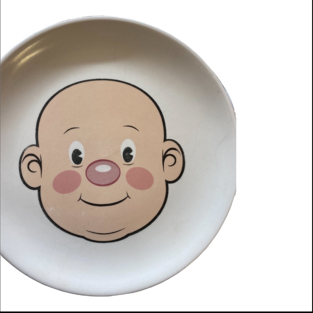Fred plays with his food dinner plate